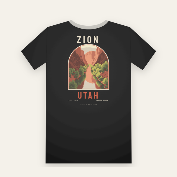 Black tee, back print: a red rock canyon and river inside an arch, ZION above, UTAH below