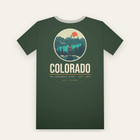 Forest green tee, back print: a hiker above a turquoise lake and snowy peaks in a circle, COLORADO below