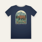 Navy tee, back print: a grizzly bear in a wildflower meadow under a snowy peak, inside a large arch