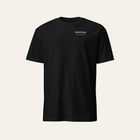 Black tee photographed from the front: Montana in wood type on the left chest
