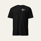 Black tee photographed from the front: small wave print and Pacific Coast on the left chest