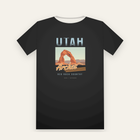 Black tee, back print: faded UTAH over a sandstone arch at sundown, Arches in retro script