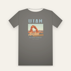 Charcoal tee, back print: faded UTAH over a sandstone arch at sundown, Arches in retro script